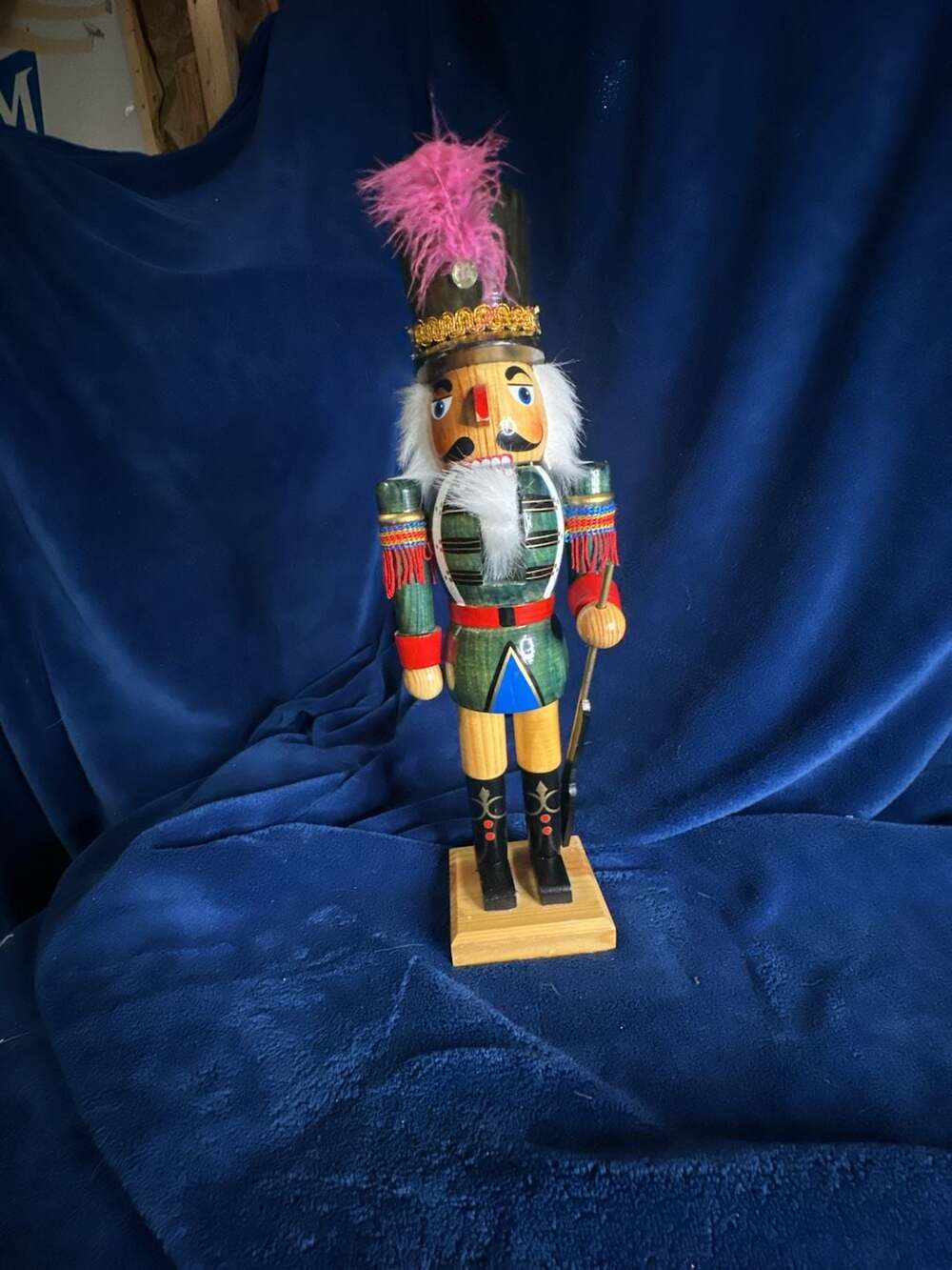 Vintage Style Wooden Christmas Nutcracker Soldier in Green Uniform with Pink Fea